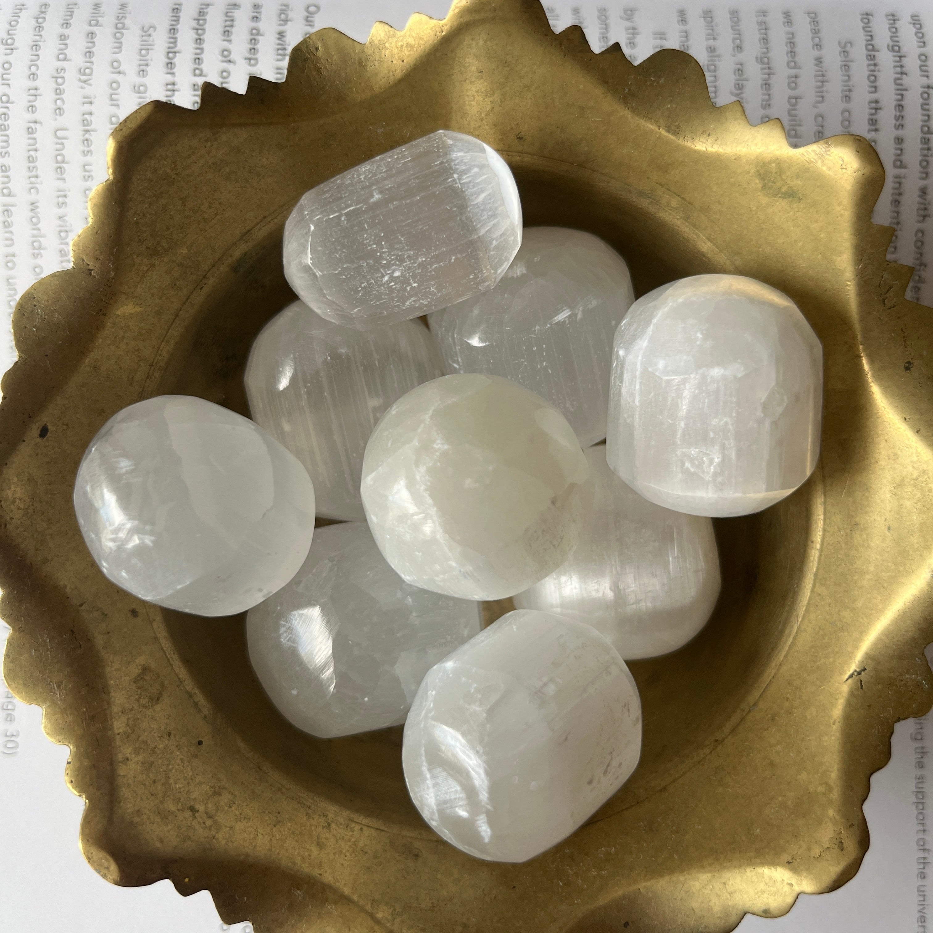 Selenite (Satin Spar) Tumblestones in a gold bowl